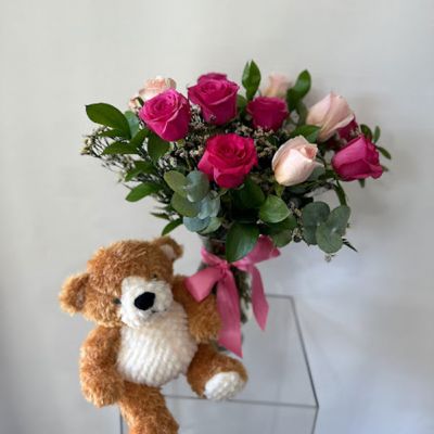 <span data-sheets-value="{"1":2,"2":"This lovely arrangment is a combination of different shades of pink roses and greenery with a soft cuddly Mr. Bobo Medium Bear"}" data-sheets-userformat="{"2":769,"3":{"1":0},"11":4,"12":0}">This lovely arrangement is a combination of different shades of pink roses and greenery with a soft cuddly Mr. Bobo Medium Bear.</span>